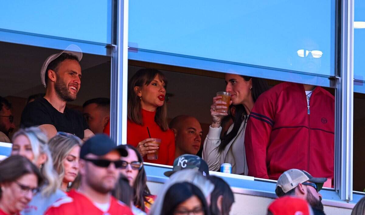 Taylor Swift and Caitlin Clark watch the Kansas City Chiefs play the Los Angeles Chargers at Arrowhead Stadium in Kansas City on Oct. 18, 2026.