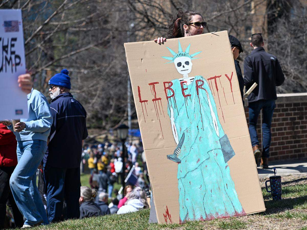 Protesters gathered in Mill Creek Park near the Country Club Plaza on Saturday, March 28, 2026, for a No Kings protest against the Trump administration. It's the third round of No Kings protests that have swept the nation over the past year.
