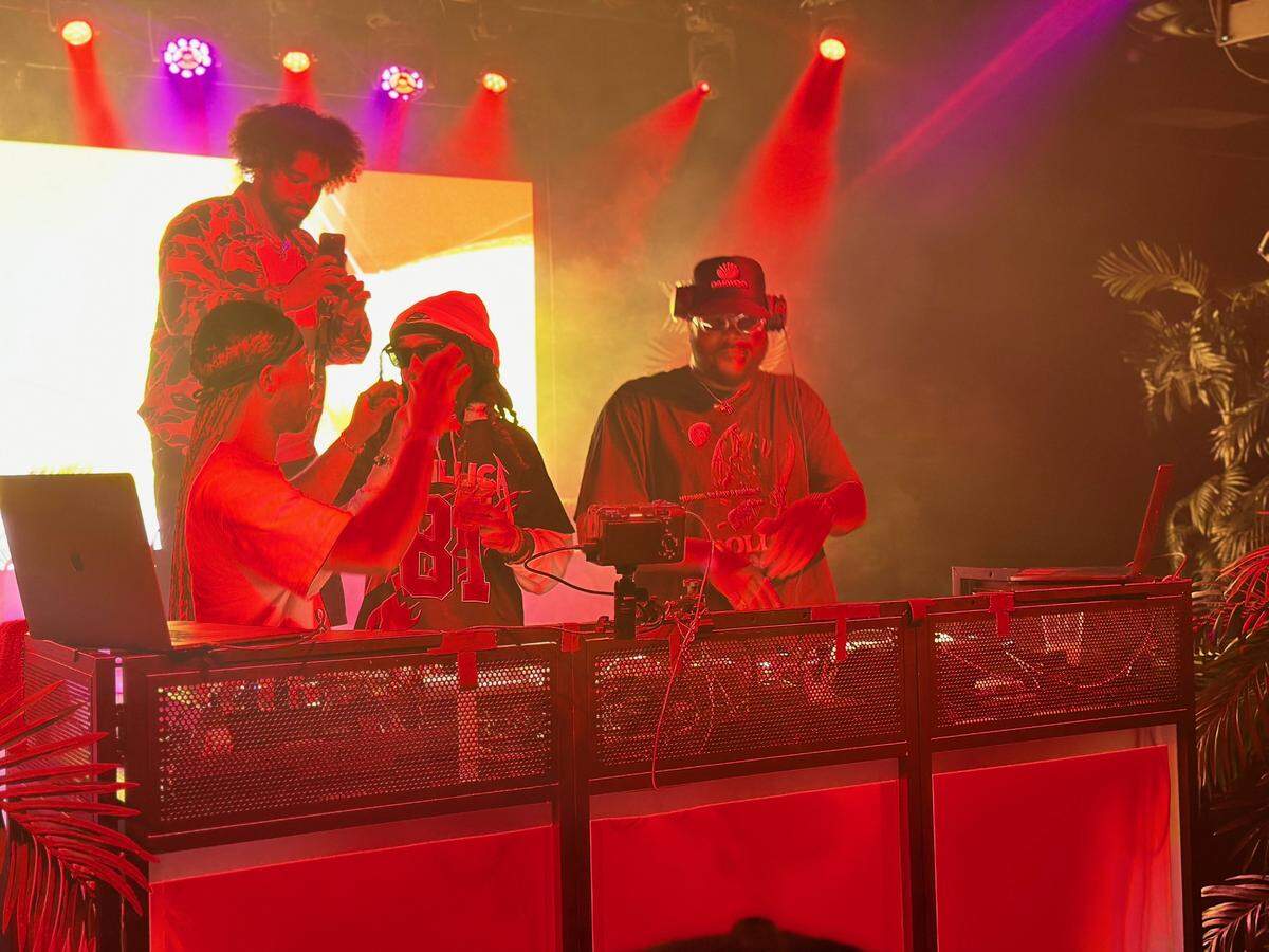 DJs Dom Chronicles, top left, with a cell phone in hand, and Casio McCombs, right, with a hat on, came together to create the party series More Than Friends. The series recently celebrated its third anniversary in its current home venue, Warehouse On Broadway.