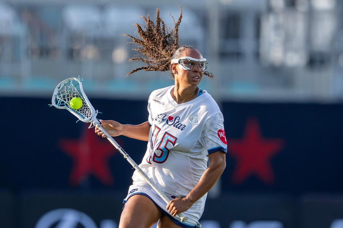 Team Izzy defender Kayla Wood (45) runs with the ball in the first quarter during the Maybelline Women’s Lacrosse League All-Star Game against Team North at CPKC Stadium on Friday, July 4, 2025, in Kansas City.