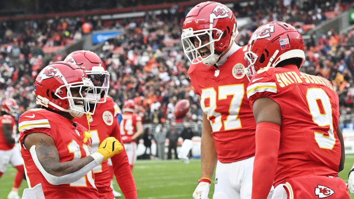 Kansas City Chiefs wide receiver JuJu Smith-Schuster, left, celebrates his TD with tight end Travis Kelce (No. 87) during a Week 15 NFL game against the Cleveland Browns at Huntington Bank Field in Cleveland, Ohio on Sunday, Dec. 15.