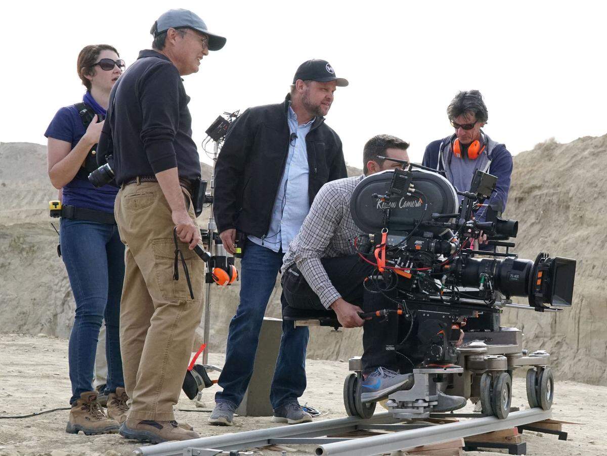 Bruce Branit, center, used to do all his work from his office, but now he is an on set VFX supervisor, watching over the episodes on location.