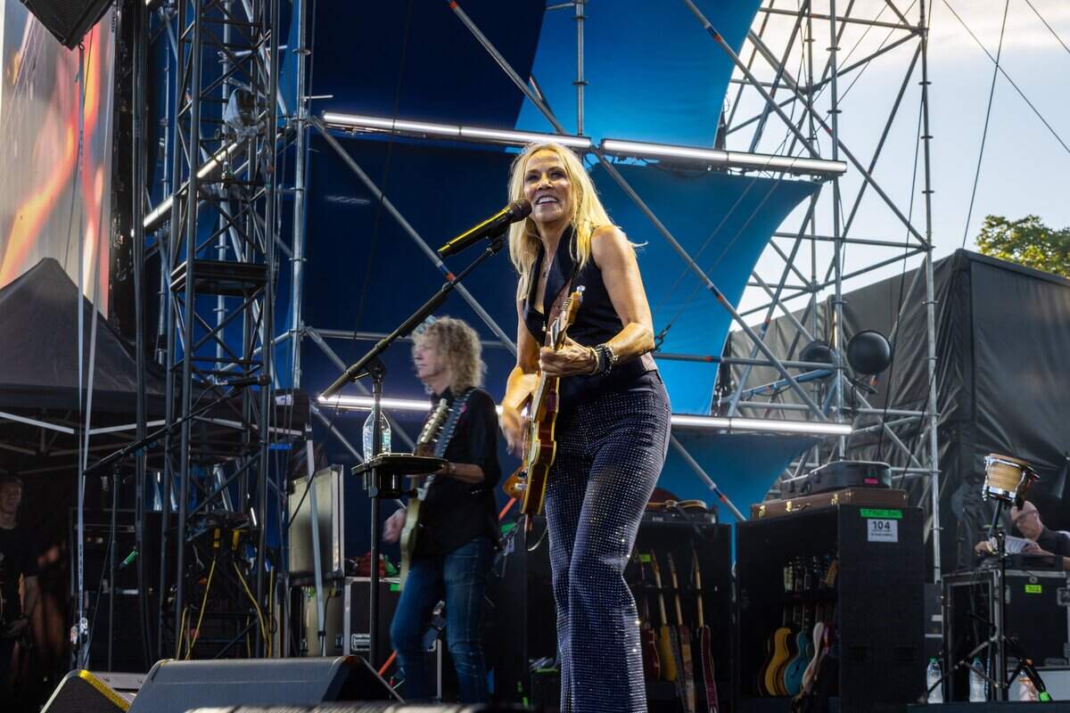 Sheryl Crow stomps their foot and leans into the beat on stage during their FIFA Fan Fest concert at Fan Fest on Friday, July 10, 2026.