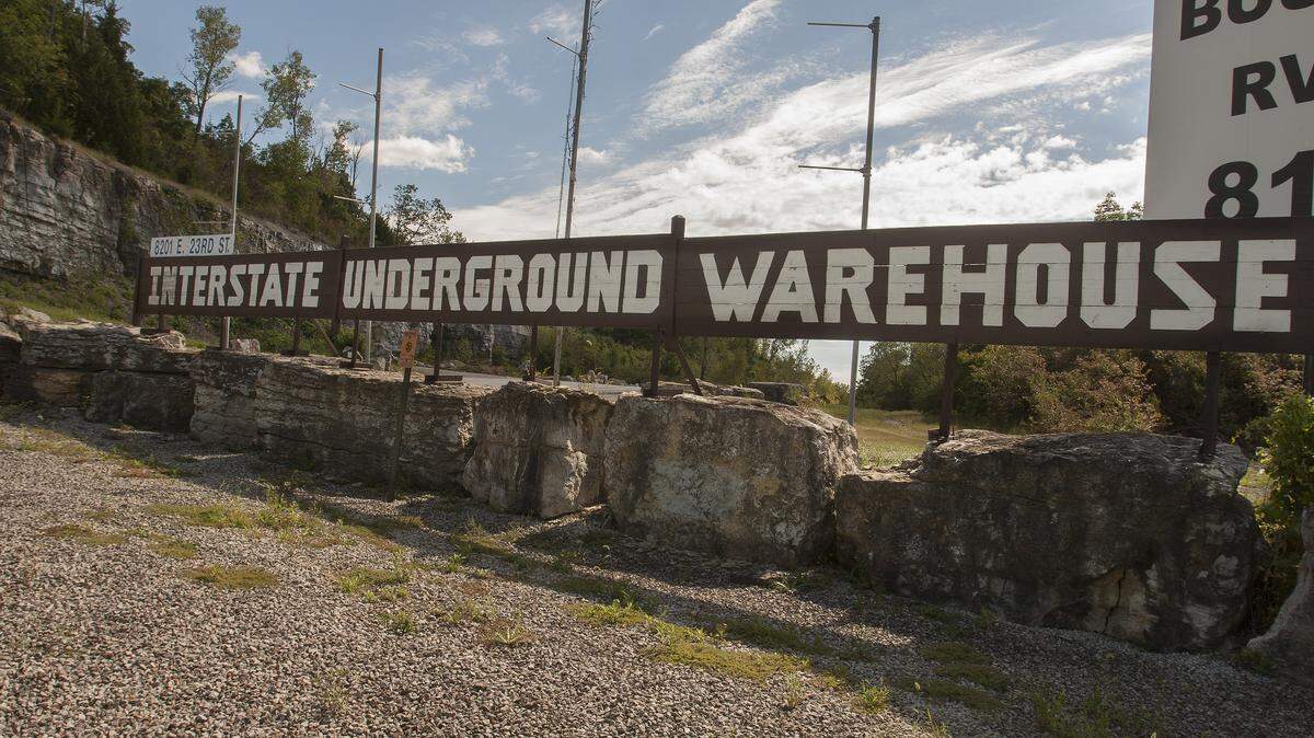 File photo of a sign for the Interstate Underground Warehouse caves located at 8201 E. 23rd Street.