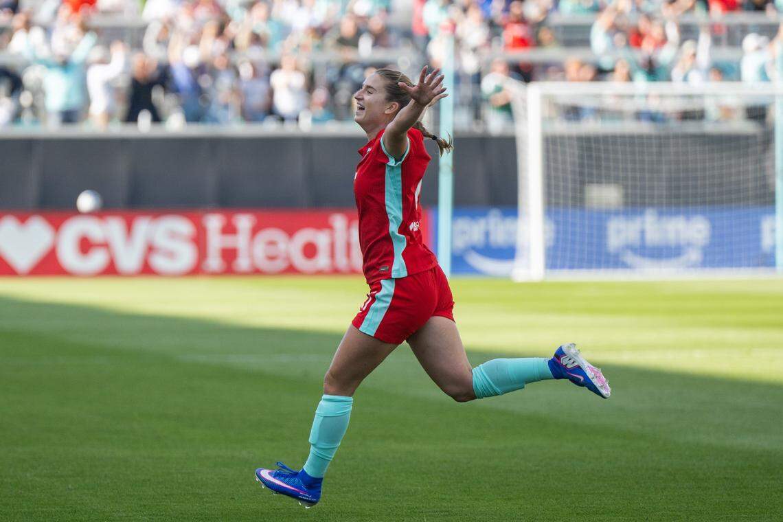 Kansas City Current forward Ally Sentnor (21) celebrates after scoring a goal in the second half of the Current's match vs. the Utah Royals, on Saturday, March 14, 2026, at the CPKC Stadium. The Current won 2-1 against the Utah Royals.