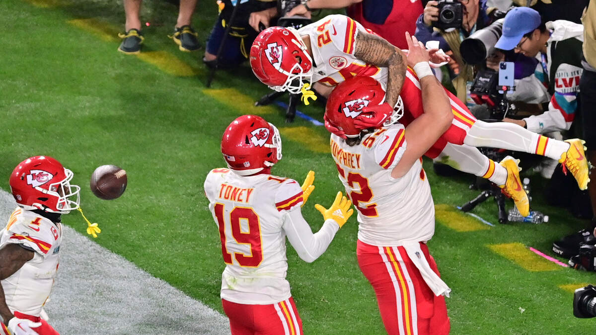 Feb 12, 2023; Glendale, Arizona, US; Kansas City Chiefs wide receiver Skyy Moore (24) celebrates with center Creed Humphrey (52) and wide receiver Kadarius Toney (19) and running back Jerick McKinnon (1) after scoring a touchdown against the Philadelphia Eagles during the fourth quarter of Super Bowl LVII at State Farm Stadium. Mandatory Credit: Matt Kartozian-USA TODAY Sports
