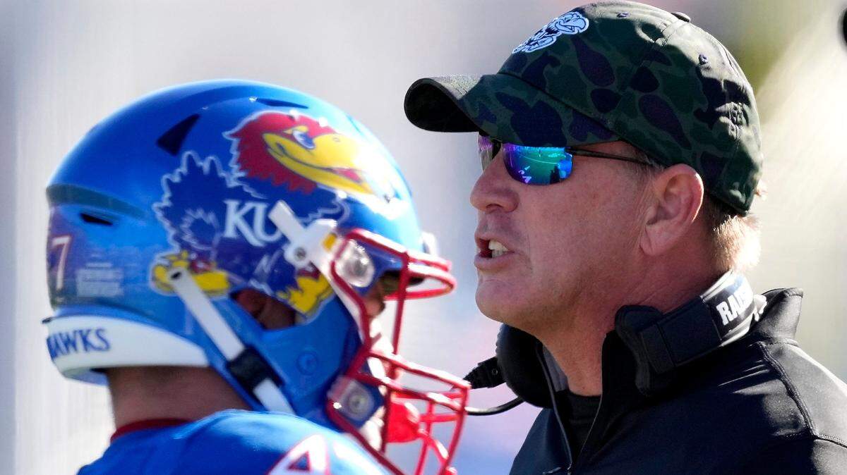 Kansas coach Lance Leipold talks to his players during the first half against Oklahoma State on Nov. 5, 2022, in Lawrence.