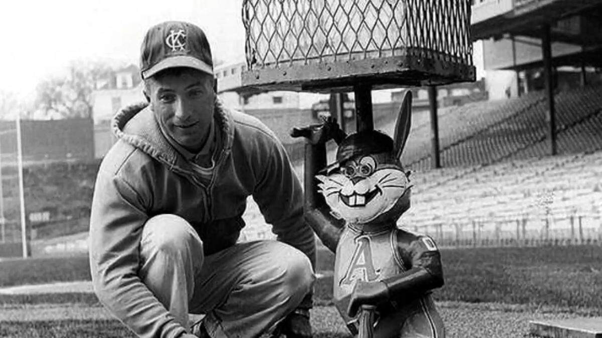 George Toma and Harvey the mechanical rabbit. 1960s.