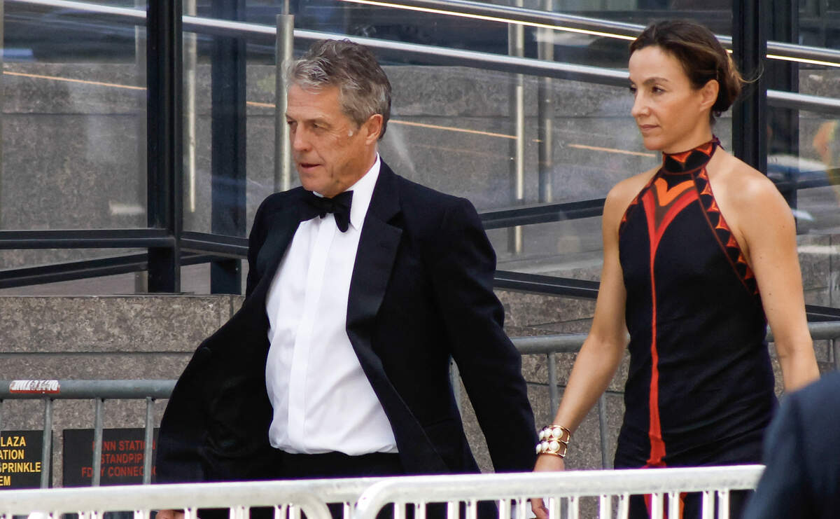 British actor Hugh Grant and Swedish producer Anna Elisabet Eberstein arrive at Madison Square Garden.