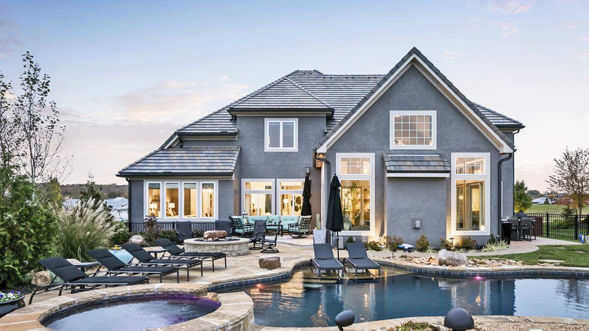 Available now! This newer, award-winning 1½-story home by Don Julian Builders is located on the Tom Watson Signature Course.