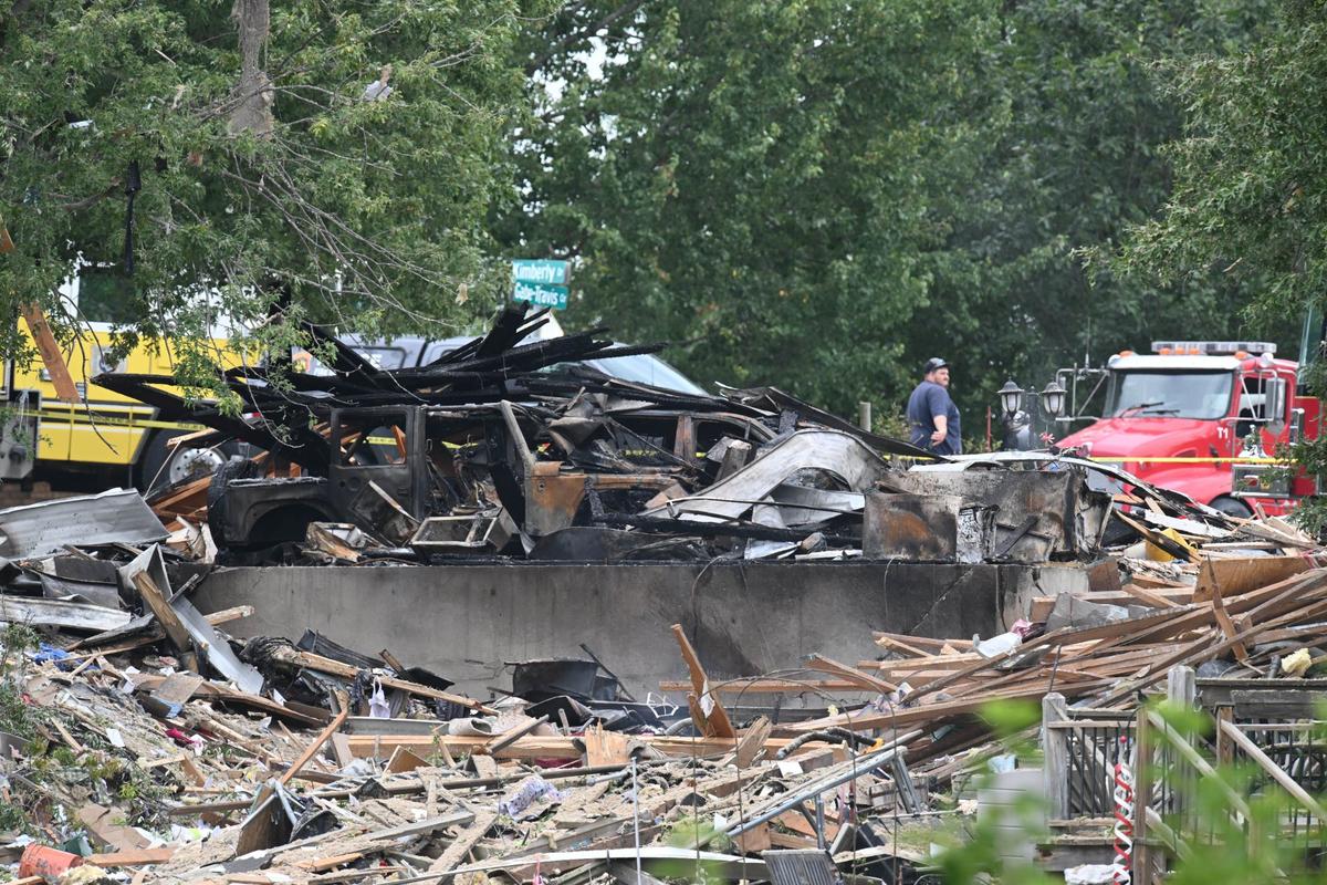 Debris rests on the foundation from a home explosion that happened in the early morning hours on Friday in Excelsior Springs. Investigators were on the scene.