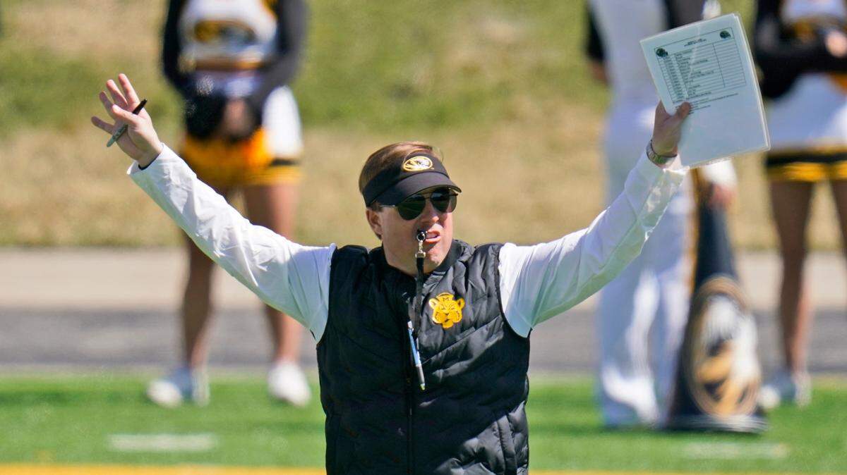 Missouri head coach Eliah Drinkwitz watches his team during an NCAA college football intra-squad spring game Saturday, March 19, 2022, in Columbia, Mo. (AP Photo/Jeff Roberson)
