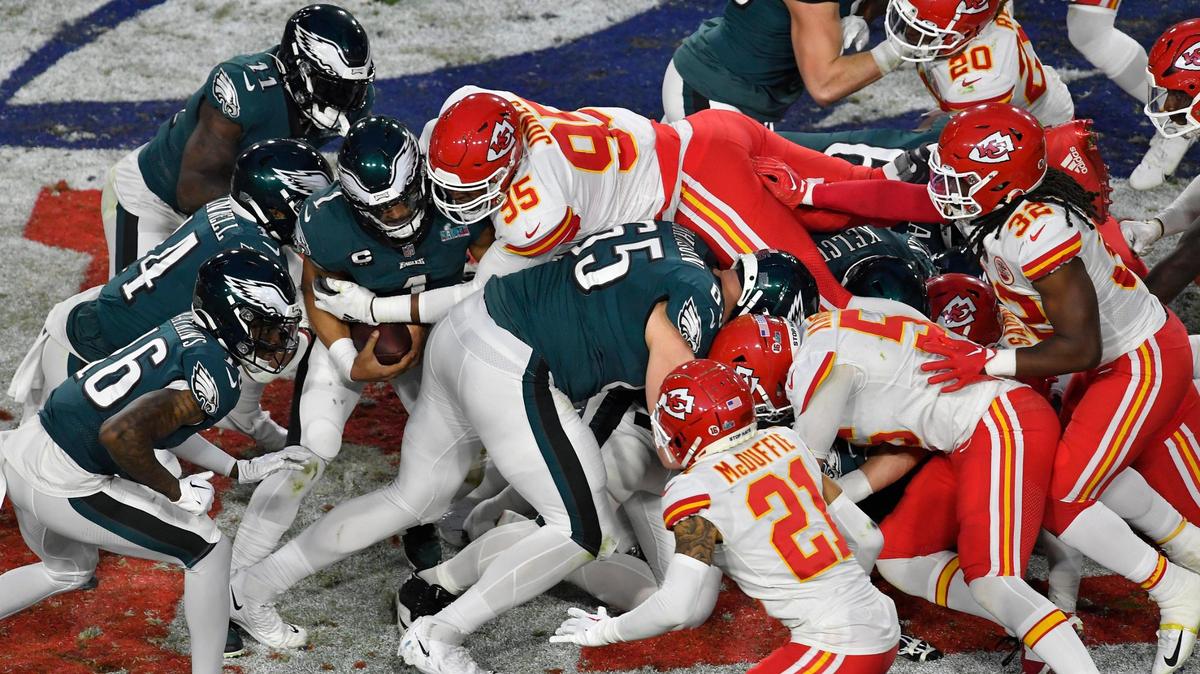 Chiefs defensive end Chris Jones jumps on Philadelphia quarterback Jalen Hurts during the second half of Super Bowl LVII, on Sunday, Jan. 29, 2023, in Glendale, Ariz.