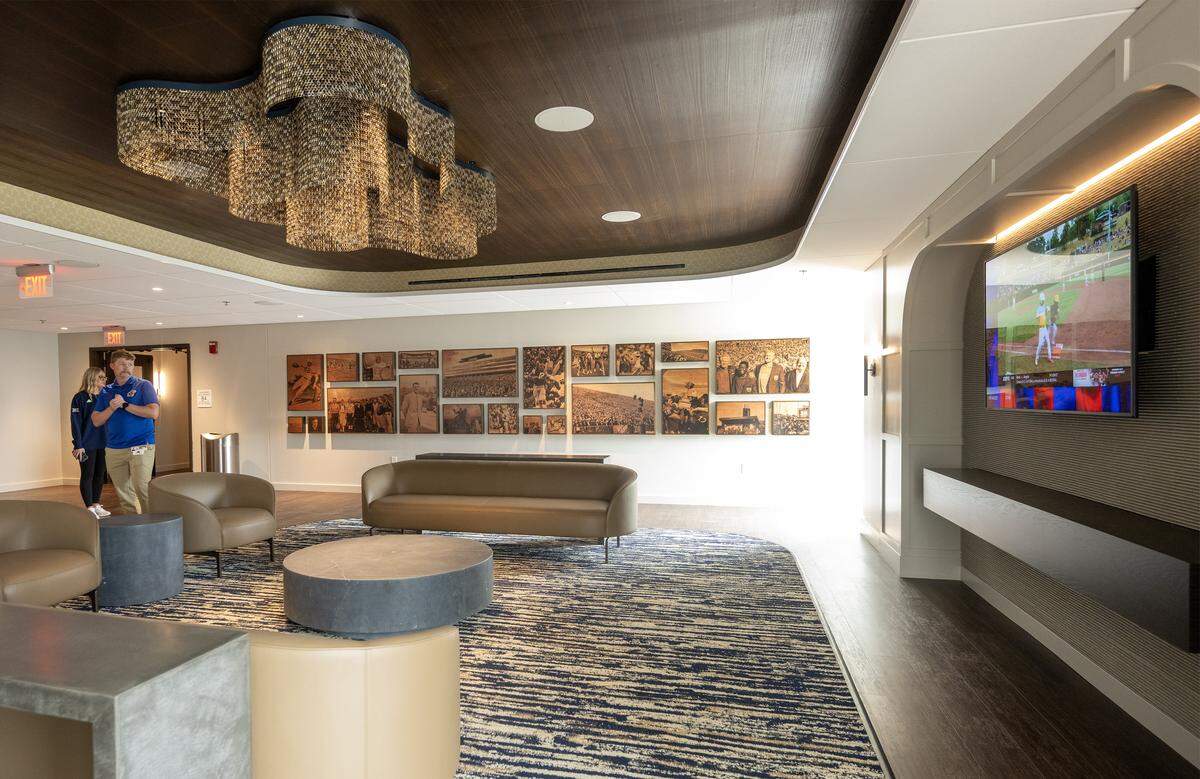 A lounge area in the Founders Level at David Booth Kansas Memorial Stadium on Tuesday, Aug. 19, 2025, at the University of Kansas in Lawrence.  