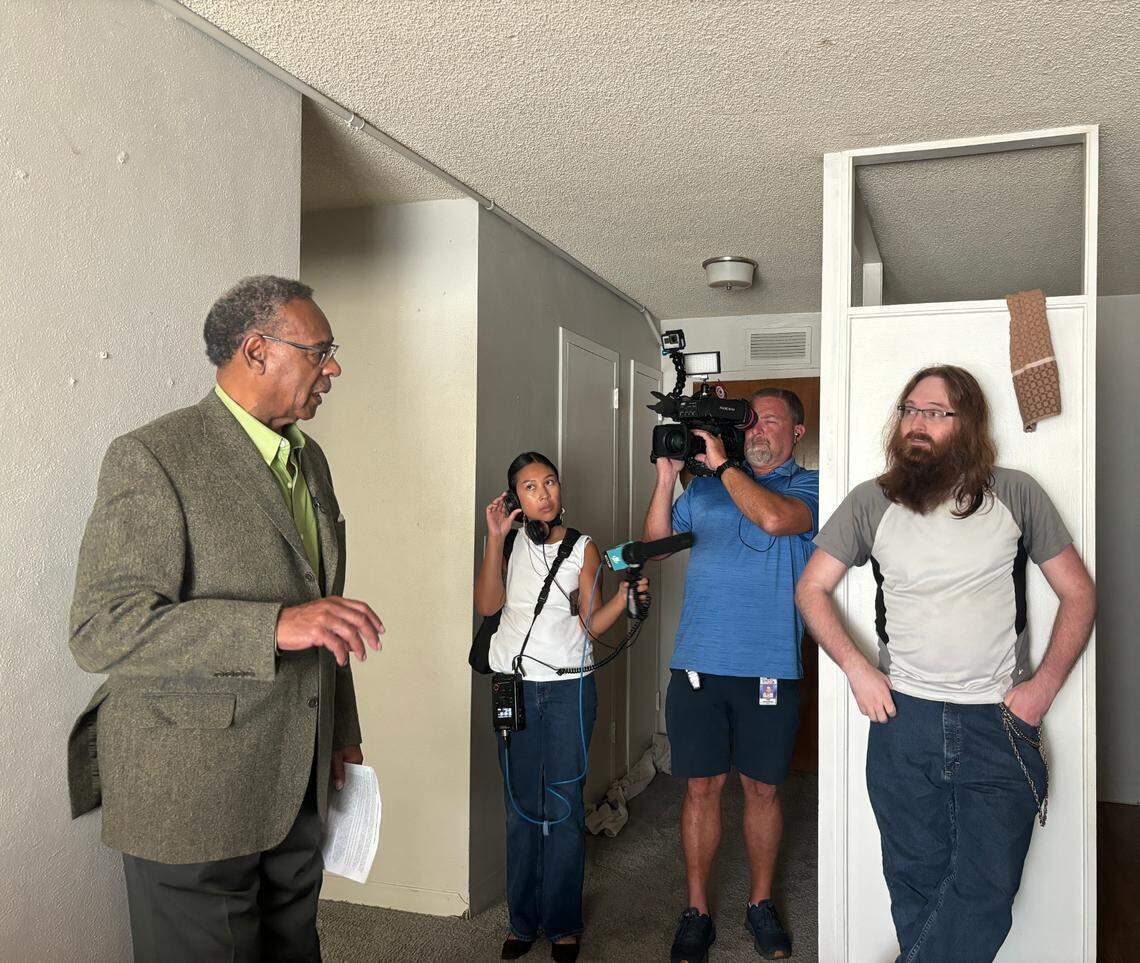 Emanuel Cleaver II tours tenant Matt Fullerton’s apartment on the second floor of Independence Towers on Sept. 3, 2024.
