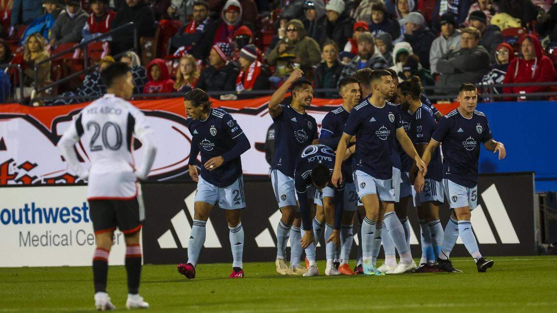 Sporting Kansas City forward Daniel Salloi celebrates with teammates after scoring the team’s first goal of the 2023 MLS season at FC Dallas Saturday night.