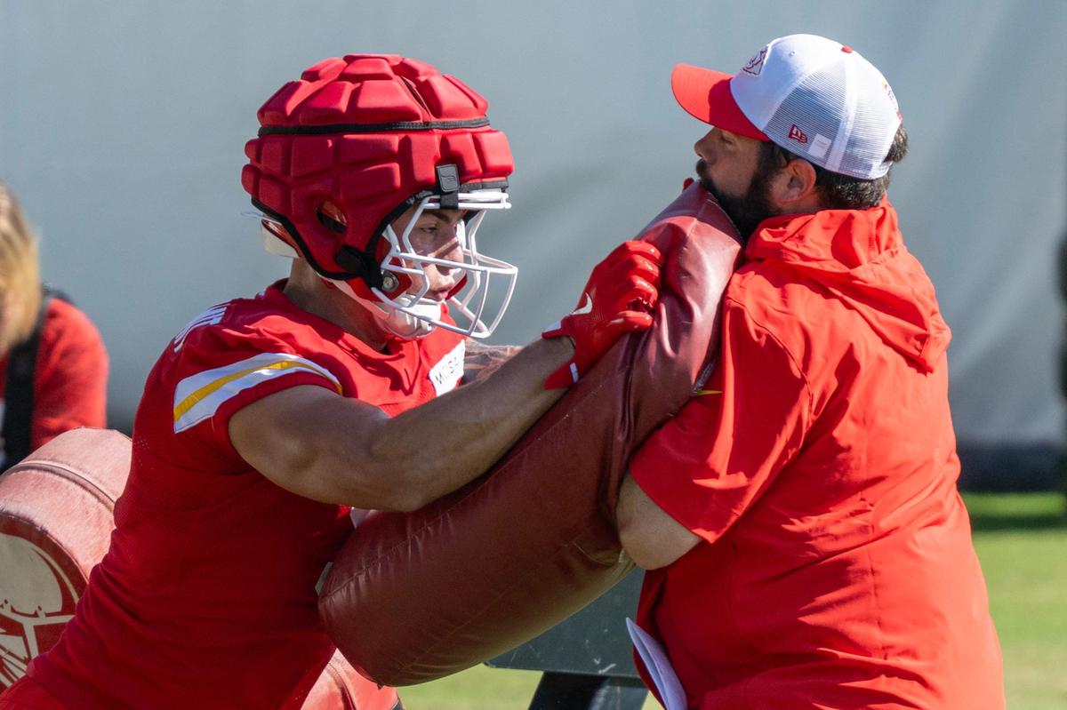 Kansas City Chiefs running back Louis Rees-Zammit (9) goes through a drill with assistant running back coach Porter Ellett during practice at Chiefs training camp on Thursday, July 18, 2024, in St. Joseph.
