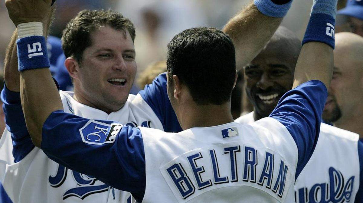 Kansas City Royals’ Mike Sweeney, left, receives congratulations from Carlos Beltran after Sweeney’s game-winning hit in the bottom of the ninth in a 5-4 win over San Francisco on June 15, 2003.