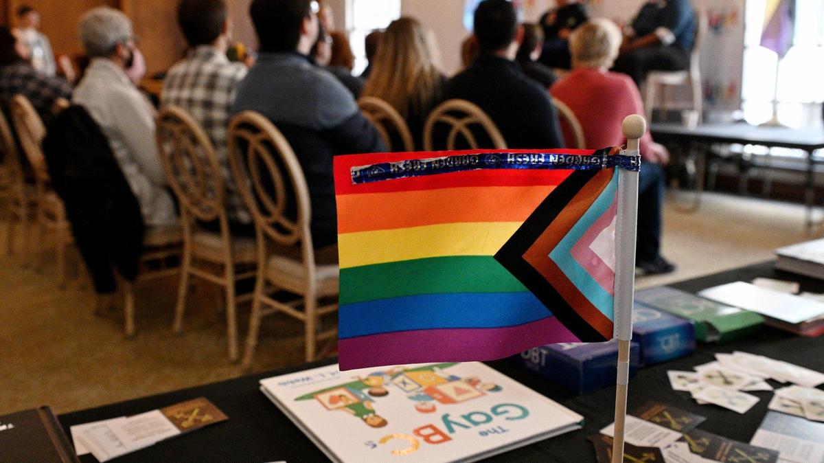 A Pride Flag stood on a table near a panel discussion on allyship.To celebrate Transgender Day of Visibility, the Mid-America LGBT Chamber of Commerce held an event, Transformation in the Workplace at the Kansas City Club Thursday, March 31, 2022.
