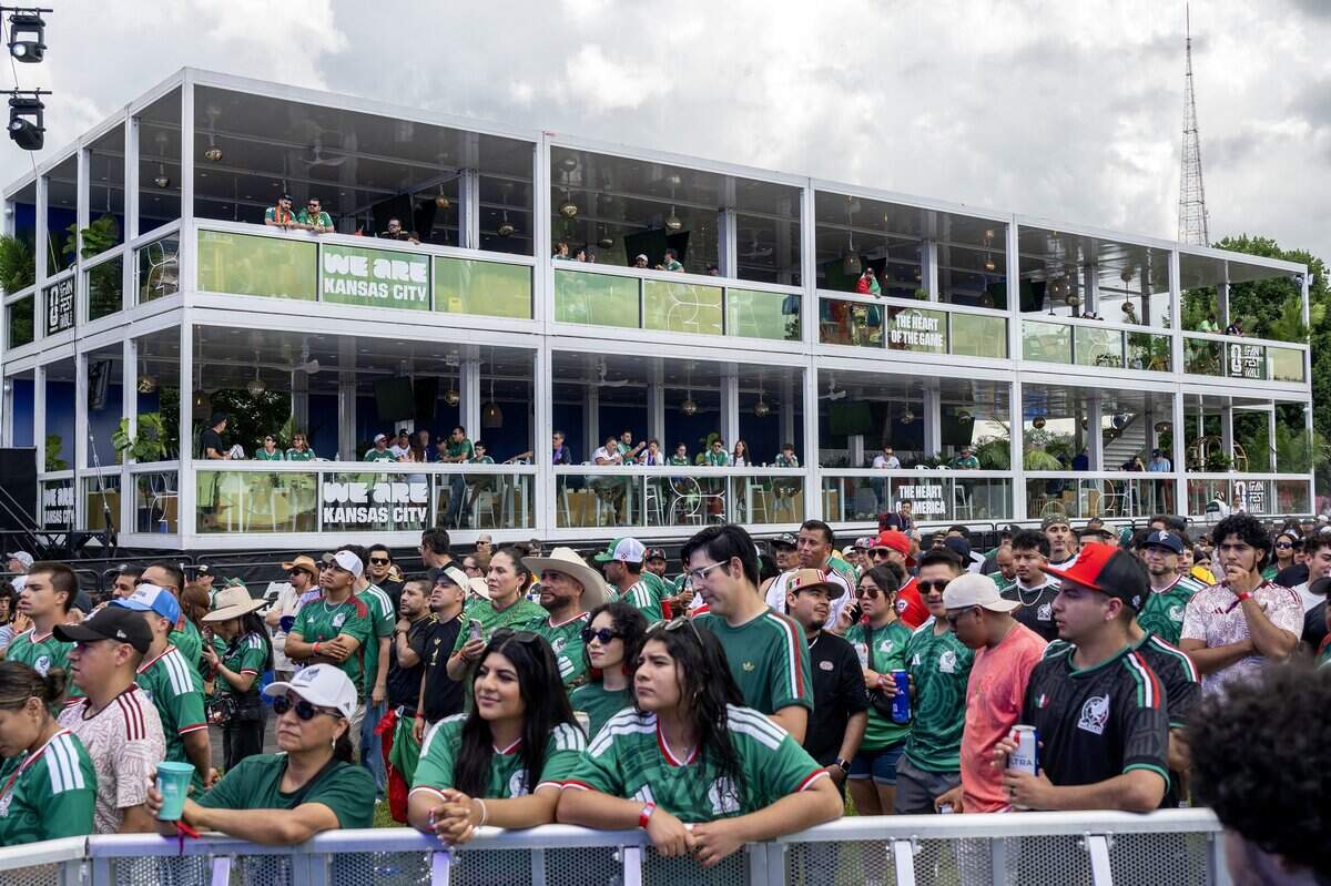 Visitors watch a FIFA World Cup match between Mexico and South Africa inside the Legacy Lounge during the FIFA Fan Festival on Thursday, June 11, 2026, in Kansas City.