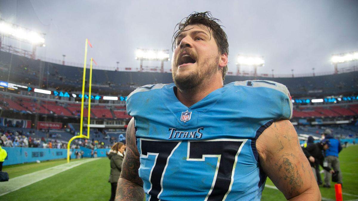 Tennessee Titans offensive tackle Taylor Lewan (77) celebrates their 34 to 3 win against the Miami Dolphins at Nissan Stadium Sunday, Jan. 2, 2022 in Nashville, Tenn. Nas Titans Dolphins 010