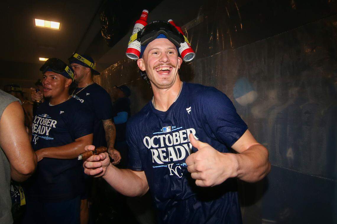 Kansas City Royals shortstop Bobby Witt Jr. (7) celebrates after clinching a wild card playoff birth after a game against the Atlanta Braves at Truist Park.
