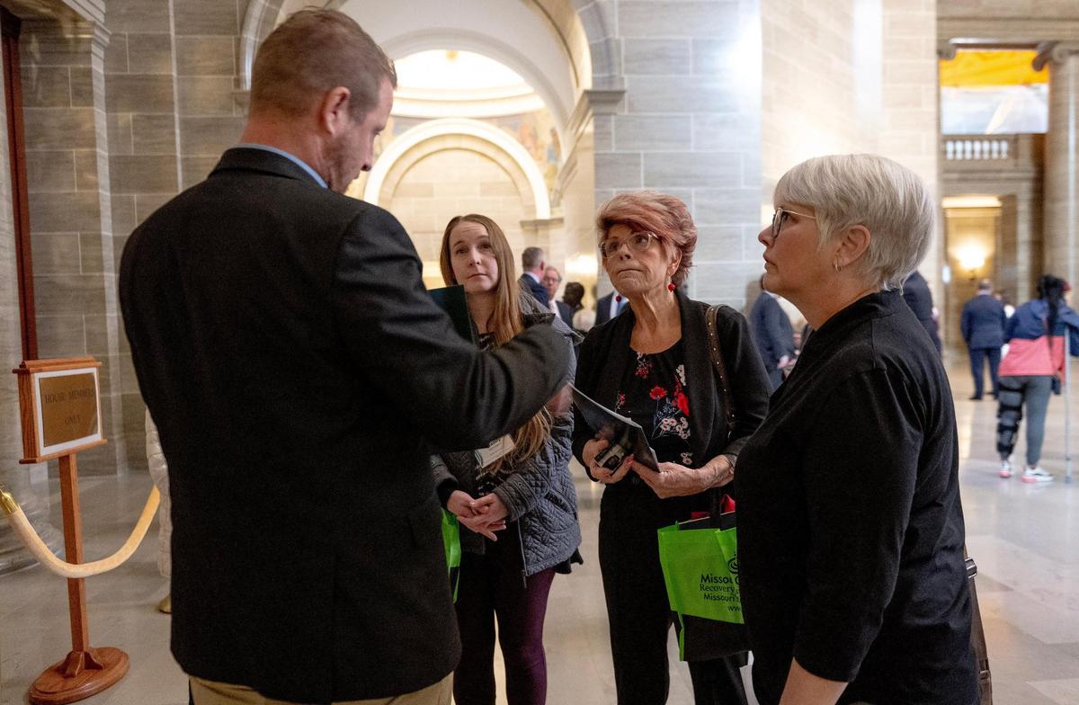 State Rep. Scott Cupps, R-Shell Knob, speaks with Darla Belflower, right, Bobbi Jo Reed and Mandy Montayne, health care leaders who were advocating for Missouri recovery and rehabilitation programs on Tuesday, March 7, 2023, at the state Capitol in Jefferson City, Mo.
