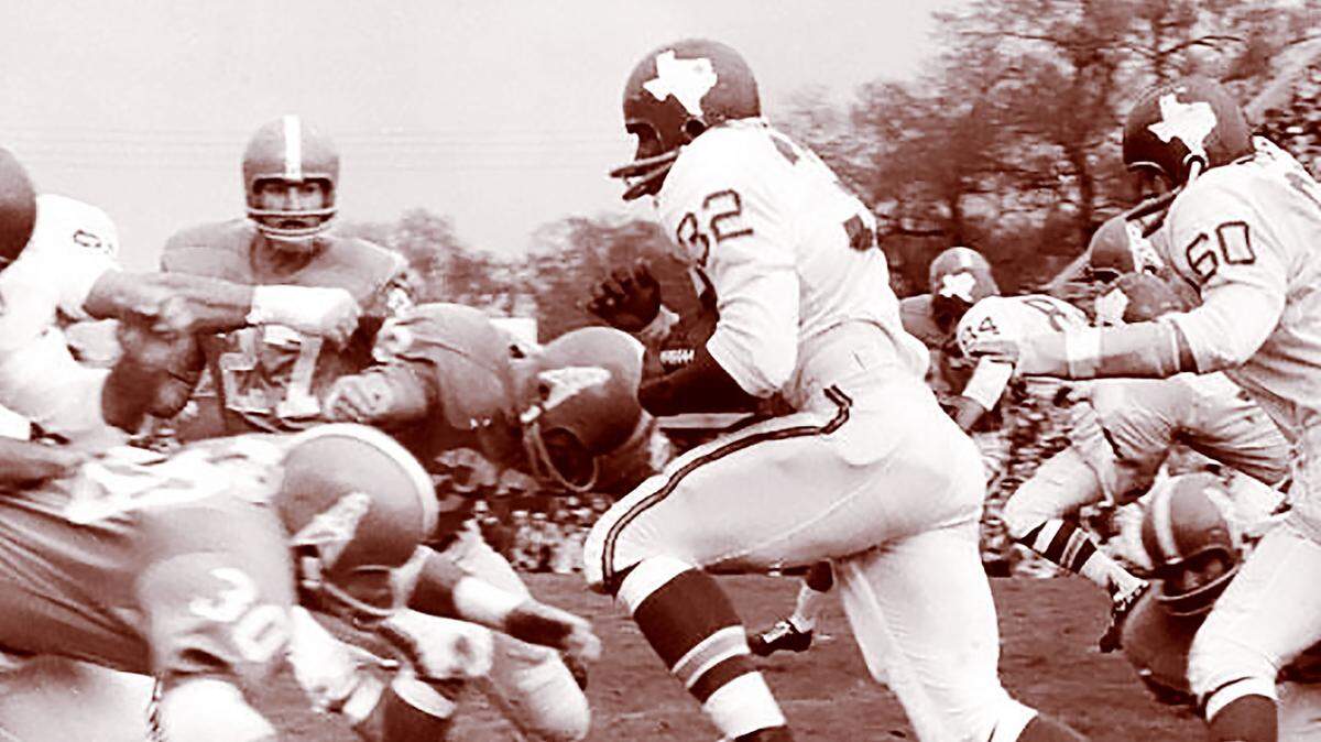 Curtis McClinton, wearing No. 32 for the Dallas Texans who would become the Kansas City Chiefs, was a force for the team from day one on offense.
