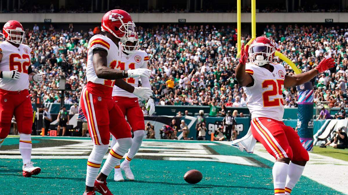 Kansas City Chiefs running back Clyde Edwards-Helaire (25) celebrates a touchdown during the first half of an NFL football game against the Philadelphia Eagles on Sunday, Oct. 3, 2021, in Philadelphia. (AP Photo/Matt Rourke)