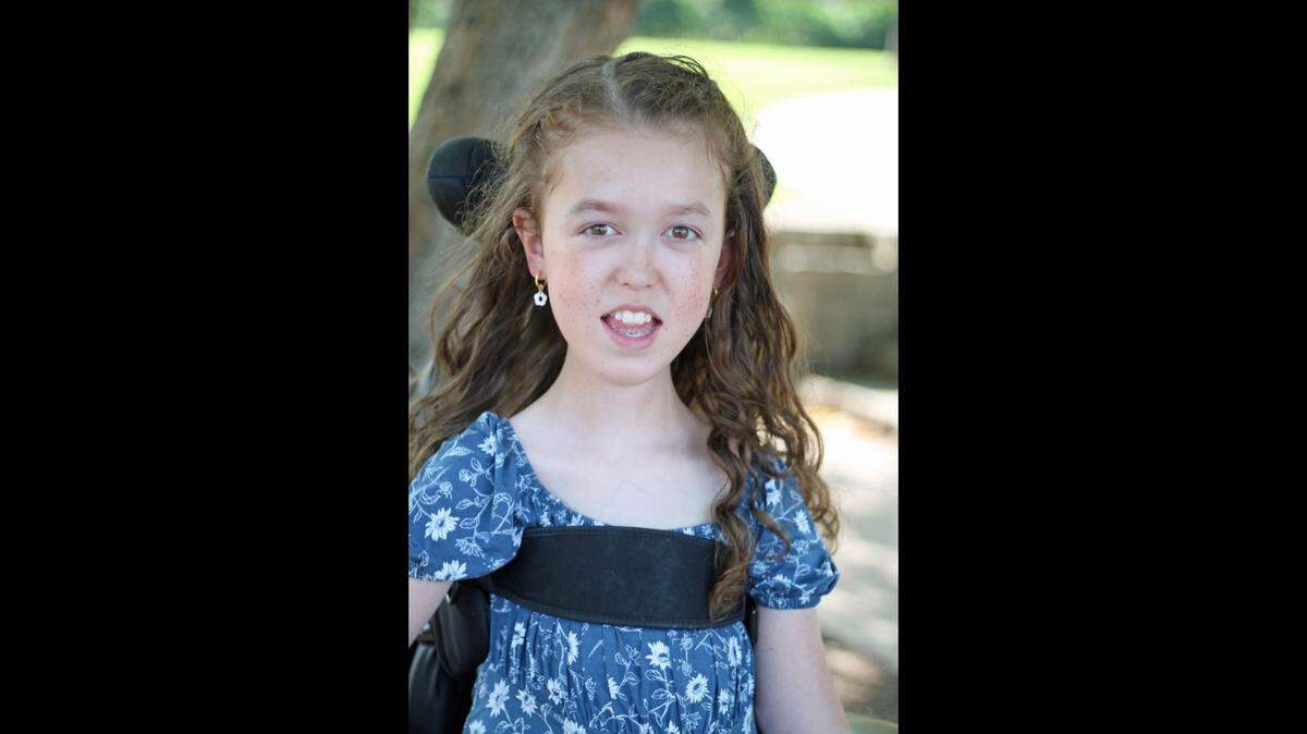 Olivia Bloomfield was born with congenital muscular dystrophy and used a power wheelchair from the age of 18 months. She was a lifelong advocate for accessibility and inclusivity. She died on July 5 at the age of 10.