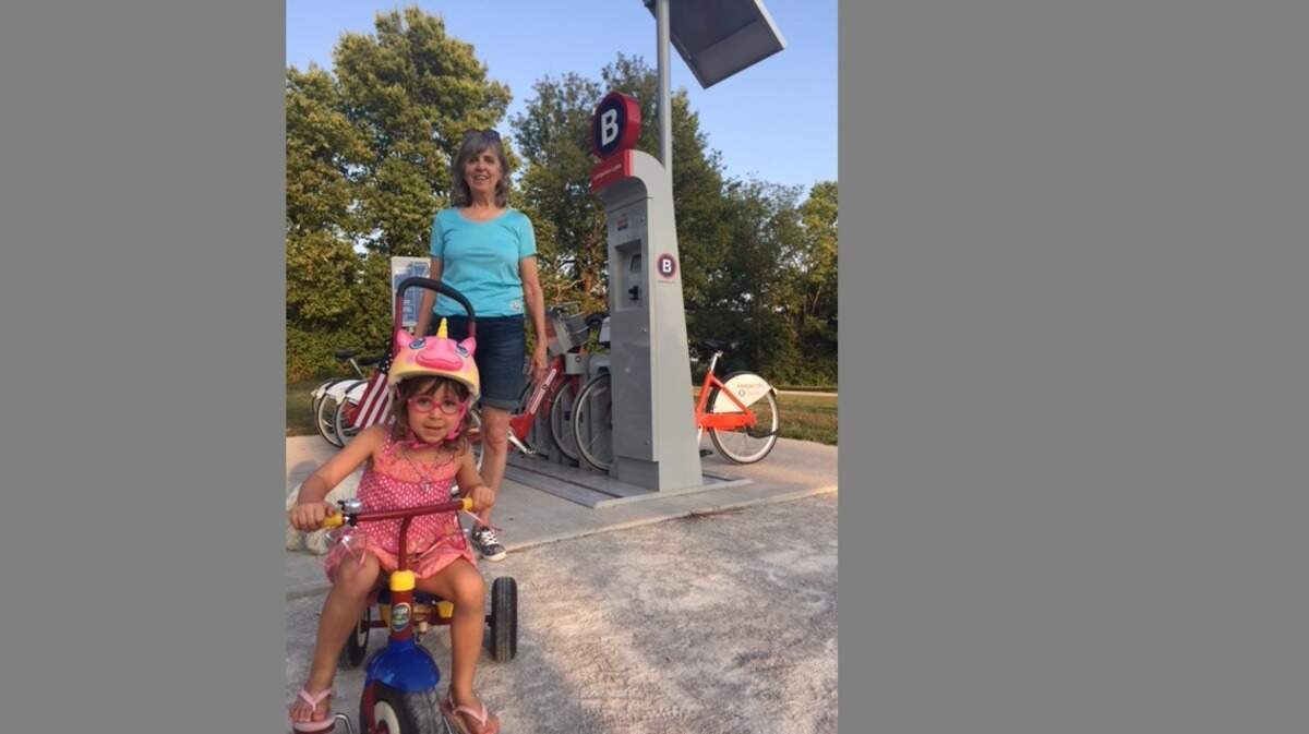 Author Jan Nelson and her child, practicing safe biking.