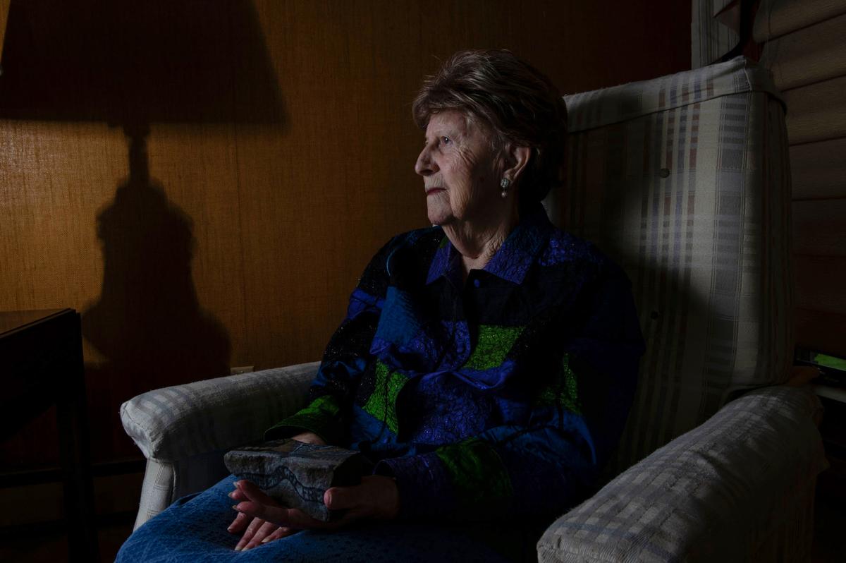 Elizabeth Nussbaum, 93, in her Overland Park home on Friday. At 16, Nussbaum and her family were sent to the Auschwitz concentration camp, and she was the only one to survive. “Animals kill for food, and some people kill for fun” she says.