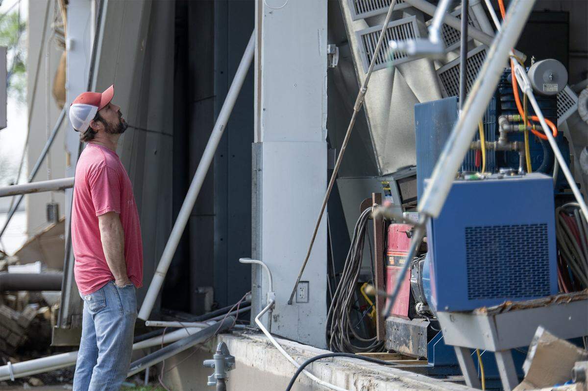 “I just really can't get over it,” said Eric Wendling, an operations manager at TruComp Pipe, as he looked over the tornado destruction at 221 W. 17th St., on Tuesday, April 14, 2026, in Ottawa, Kansas. The tornado, which hit Monday night, destroyed the manufacturing company.