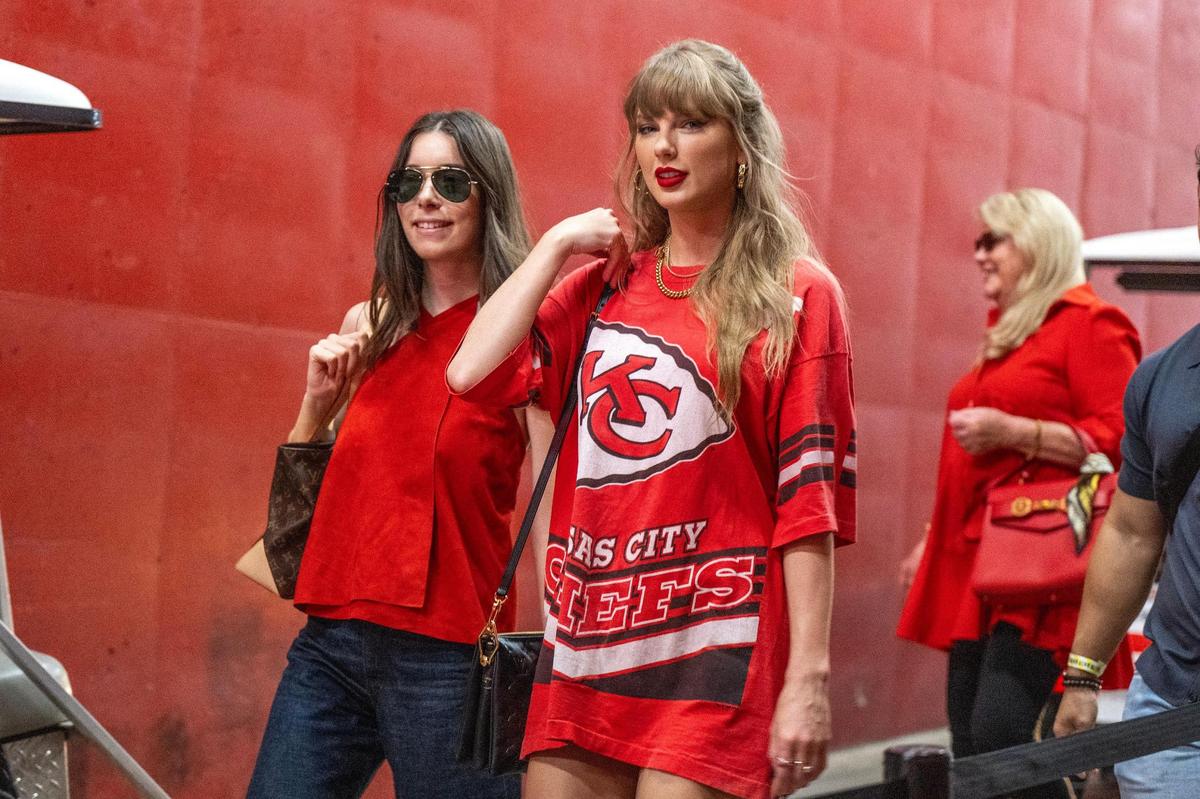 Pop star Taylor Swift and singer Danielle Haim walk down through a tunnel to attend an NFL game between the Kansas City Chiefs and the Cincinnati Bengals on Thursday, Sept. 15, 2024 at GEHA Field at Arrowhead Stadium.
