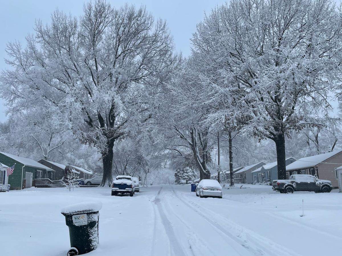 Residential streets, like this one in Shawnee, remain covered in show late Tuesday morning in much of the Kansas City metro, as a winter storm continues to move through the area. Residents, however, report that main roads at 67th Street and Quivira in Shawnee have been plowed and are in good shape.