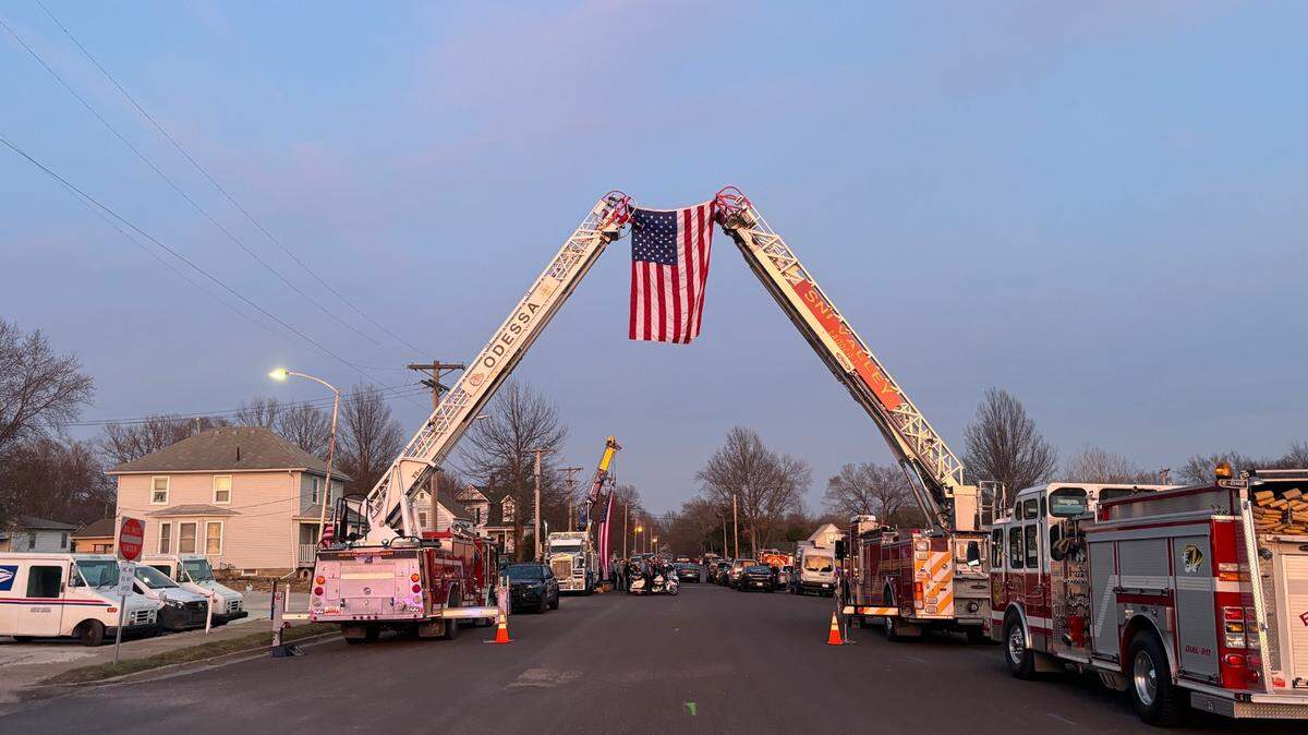 A flag hung at Officer Cody Allen’s candlelight vigil on March 3, 2024