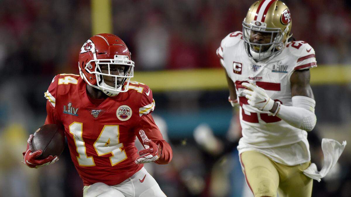 Kansas City Chiefs wide receiver Sammy Watkins (14) hauls in a deep pass over San Francisco 49ers cornerback Richard Sherman (25) late in Super Bowl 54 for a first down in the fourth quarter of Super Bowl 54 between the Kansas City Chiefs and the San Francisco 49ers at Hard Rock Stadium, Miami, Florida, February 2, 2020. The Chiefs defeated the 49ers 31-20.