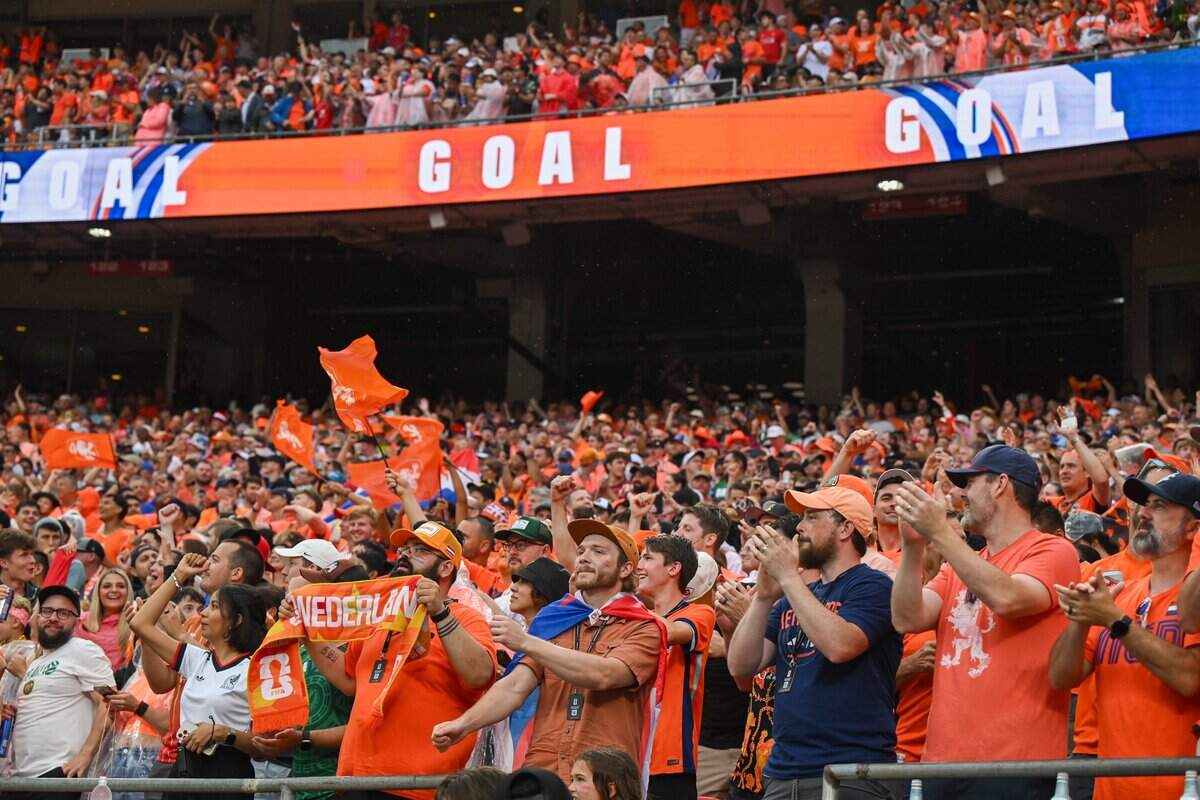 Dutch fans celebrate after the Netherlands is quickly up 2-0 against Tunisia in the FIFA World Cup group-stage soccer match at Kansas City (Arrowhead) Stadium in Kansas City on Thursday, June 25, 2026.