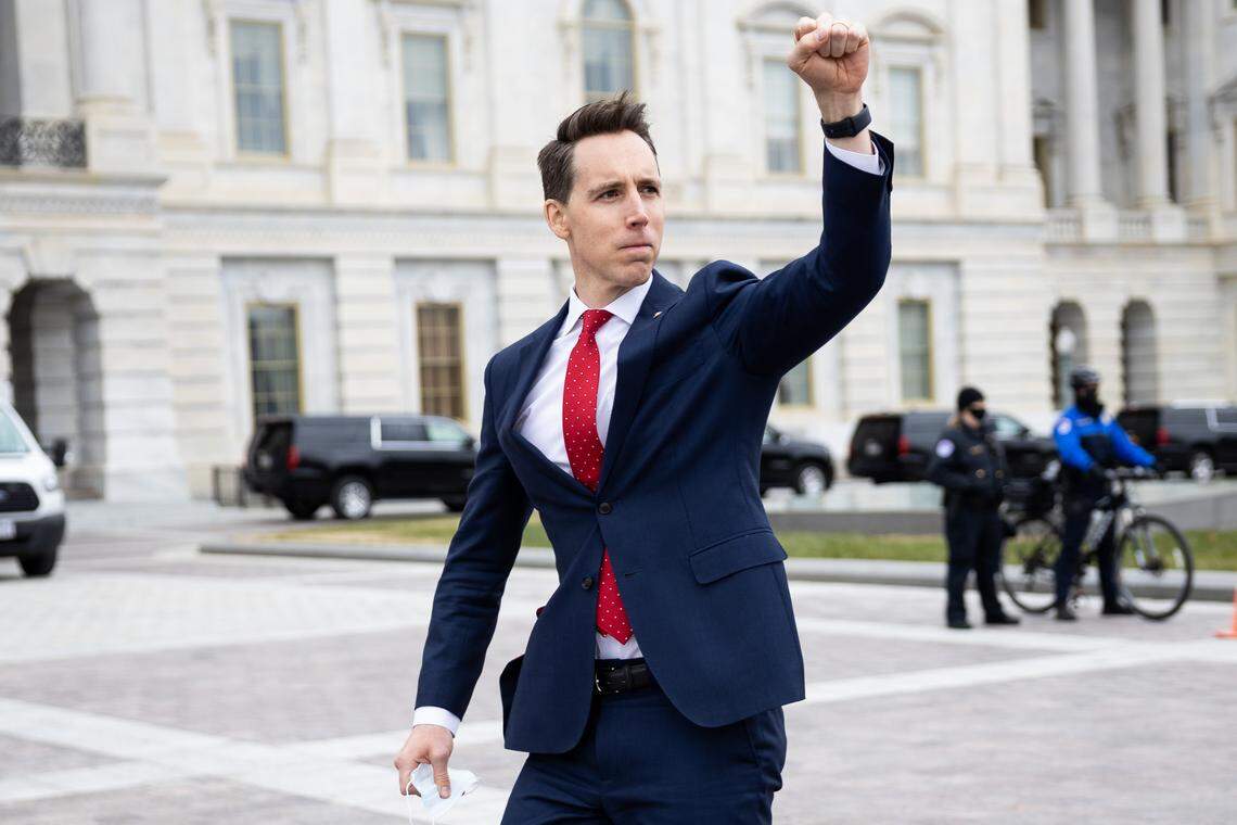 U.S. Sen. Josh Hawley of Missouri raised a fist of support to crowds gathered at the U.S. Capitol on Jan. 6 to protest certification of President-elect Joe Biden’s win. The crowd soon amassed as a mob that attacked the Capitol building.