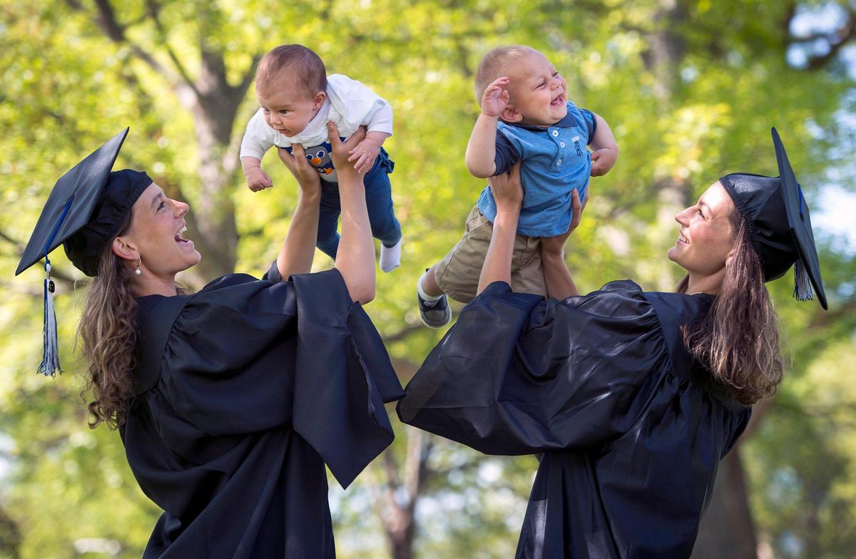 These twin sisters, 22, are both new mothers: Caroline Williams, left, with her 3-month-old daughter, Marlo Wright, and Anna Williams, with her 8-month-old son, Charlie Williams. And both will graduate from Rockhurst University in a ceremony now rescheduled for September. With the coronavirus forcing classes online, the twins said are they are grateful to have had more time at home with their babies.