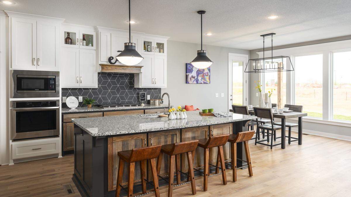 The new Cadence model home, the Jefferson plan built by Patriot Homes, is being unveiled in time for the Spring Parade, which runs daily through May 9. It is entry #56.