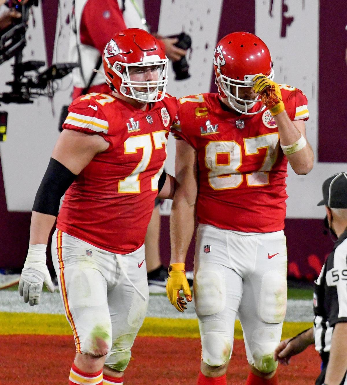 Kansas City Chiefs offensive guard Andrew Wylie consoles tight end Travis Kelce near the fourth quarter of the Kansas City Chiefs game against the Tampa Bay Buccaneers in Super Bowl LV at Raymond James Stadium in Tampa, Sunday, Feb. 7, 2021. The Buccaneers defeated the Chiefs 31-9.