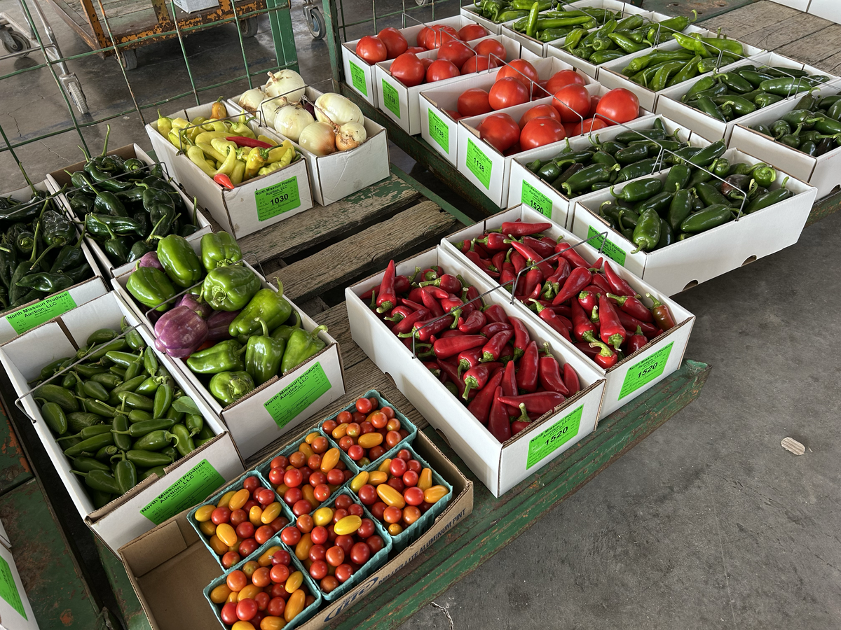 The auction, which runs three times per week from March through October, features fresh produce from Amish farms across the region.