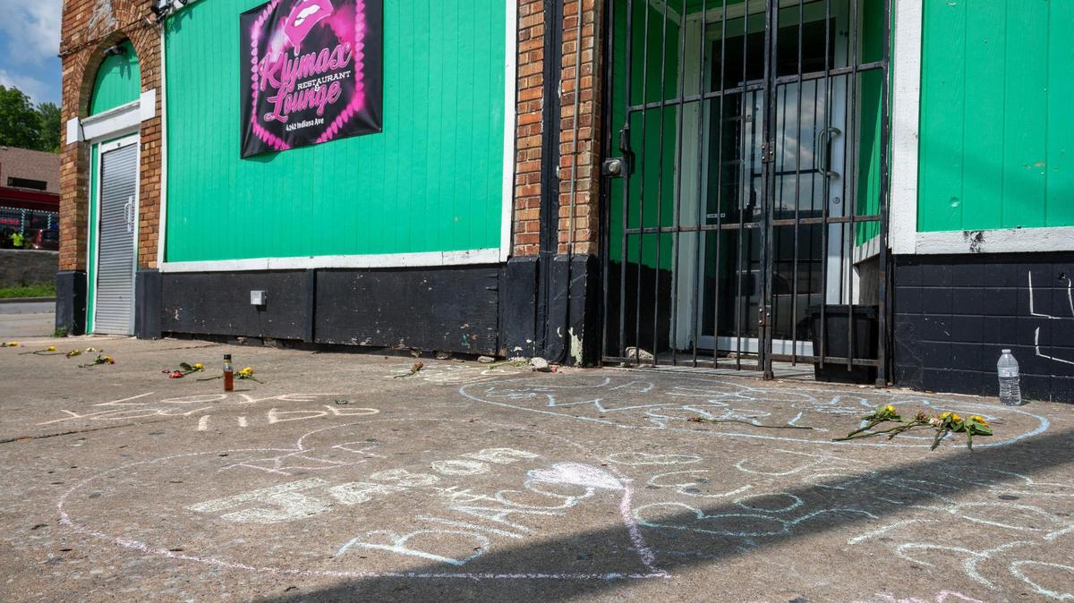 Messages written in chalk are seen on the sidewalk outside Klymax Lounge on Monday, May 22, 2023, in Kansas City. Three people were killed and two were injured in a shooting Sunday at the nightclub.