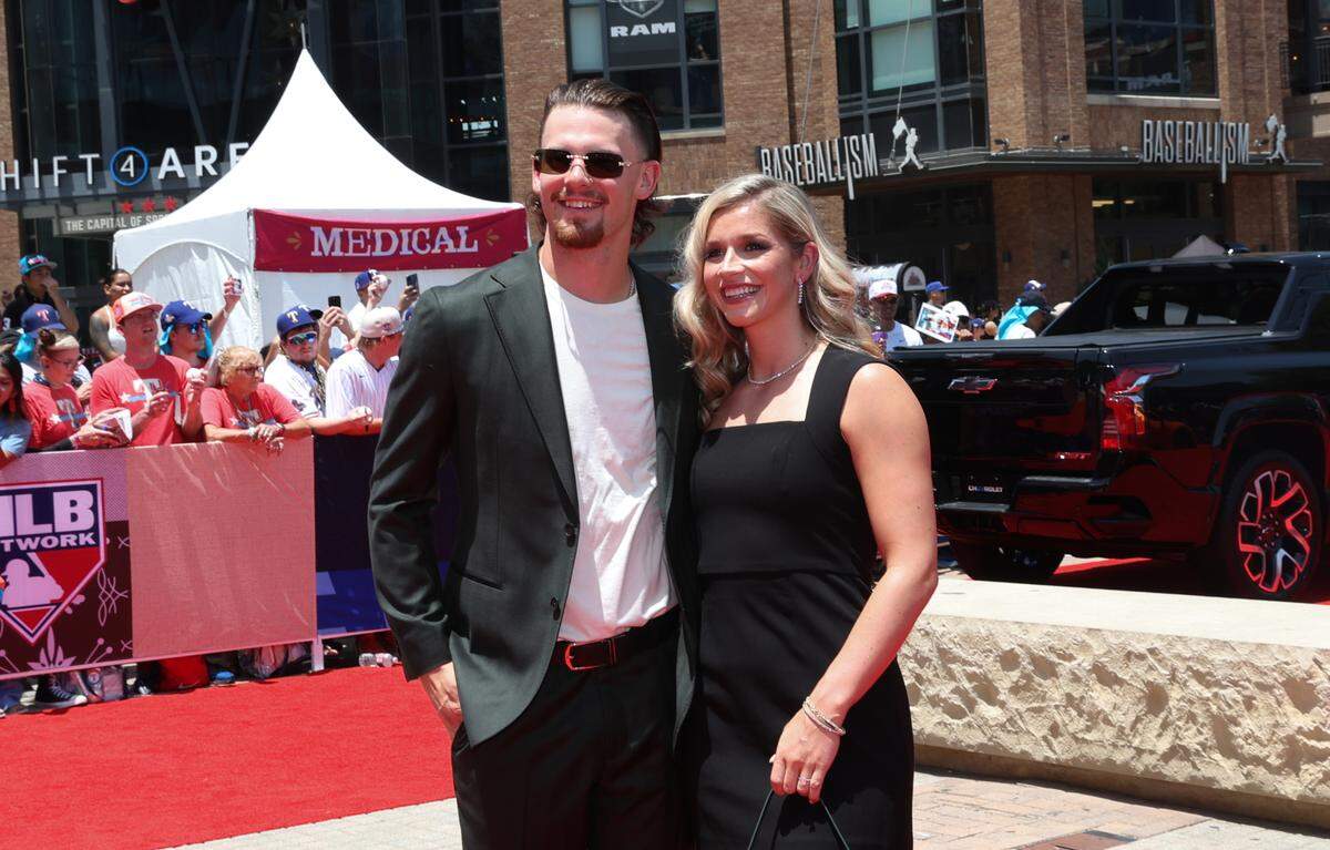 Kansas City Royals shortstop Bobby Witt Jr. walks the red carpet with his fiancee Maggie Black before the 2024 MLB All-Star game at Globe Life Field on July 16, 2024.