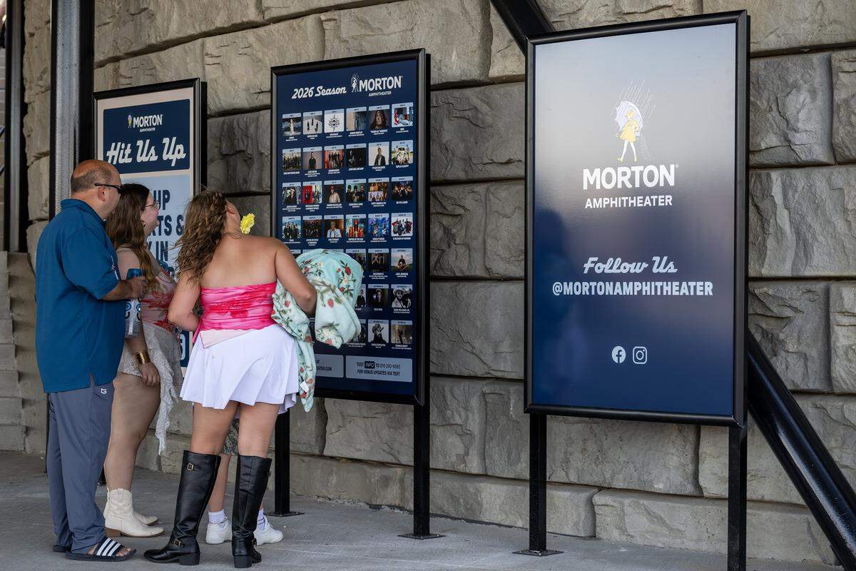 People view a calendar of summer performers at the Morton Amphitheater on Wednesday, June 3, 2026, in Riverside.