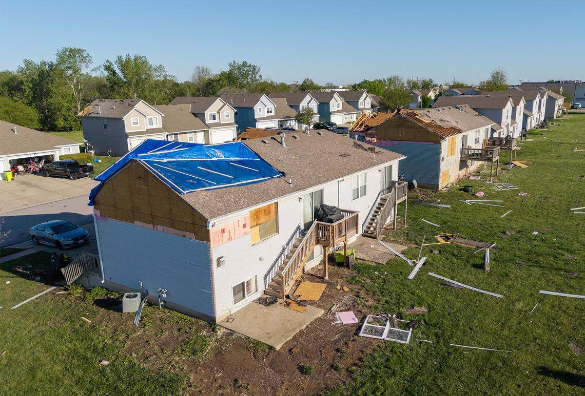 Damage to townhomes in the Hearthstone Crossing neighborhood along Conti Court and 173rd Street in Belton was visible Saturday, April 18, 2026, after a tornado touched down Friday night.