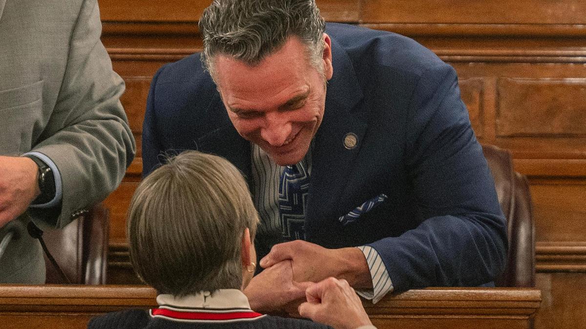 Senate President Ty Masterson greets Kansas Governor Laura Kelly before the State of the State address at the Kansas State Capital on Wednesday, Jan. 10, 2024, in Topeka, Kansas.