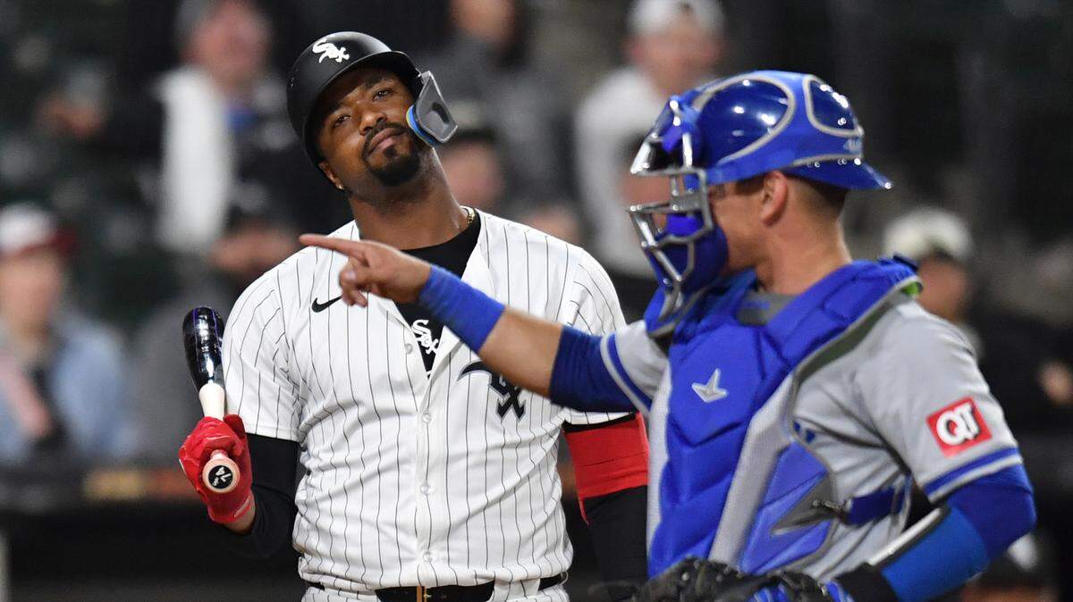 Chicago White Sox pinch hitter Eloy Jimenez (74) reacts after striking out next to Kansas City Royals catcher Freddy Fermin (34) during the ninth inning at Guaranteed Rate Field on April 15, 2024.