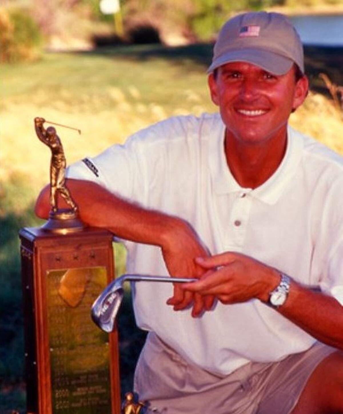 Salina native Bryan Norton has enjoyed a stellar golf career. He played professionally on the PGA Tour and for several years in Europe and was a highly decorated amateur. Here he is with his 2002 Kansas Amateur trophy.